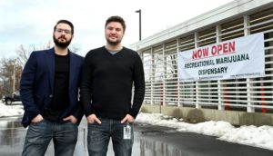 Mathew Medeiros (left) and his brother Andrew Medeiros stand outside Apotho Therapeutics, a cannabis dispensary that they opened in Plainville earlier this month.  You propose a delivery service in several Massachusetts counties. [Daily News and Wicked Local Staff Photo/Ken McGagh]