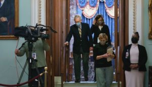 Senate Minority Leader Mitch McConnell, R-Ky., leaves the chamber after the Senate voted not guilty in the impeachment trial of former President Donald Trump.  (AP Photo/J. Scott Applewhite)