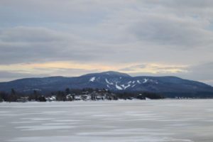 The slopes of the Big Tupper Ski Area on Mount Morris are seen from across Raquette Pond in Tupper Lake in 2018. (Photo -- Aaron Cerbone, Adirondack Daily Enterprise)