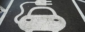Electric car / EVs - Inisghts: An electric vehicle charging sign at a charging station in the U.K. on Dec. 14, 2020.